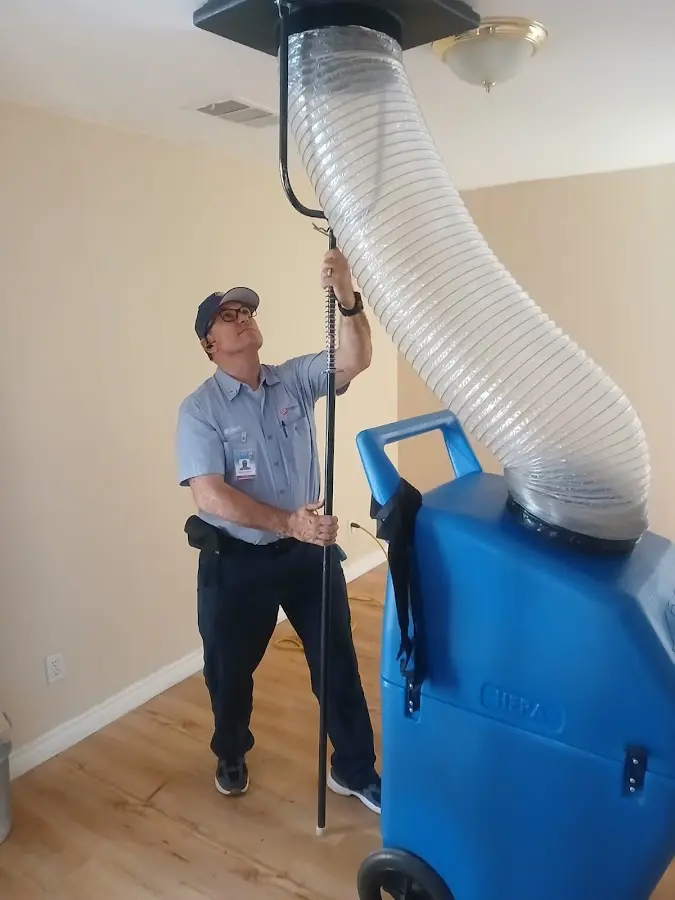 HVAC Installation technician using HEPA equipment in Blair